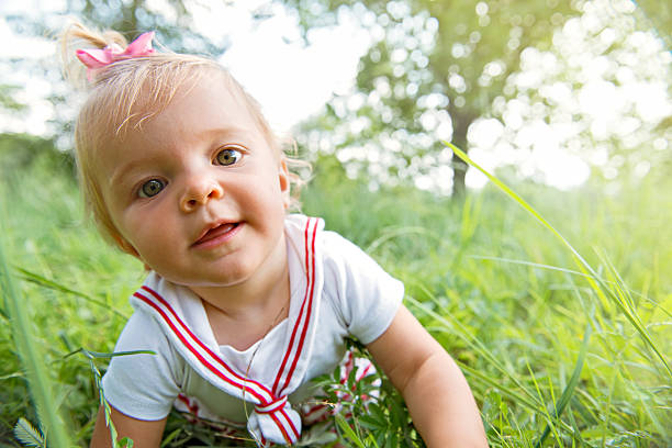 istock Curious baby crawling at park 172445266
