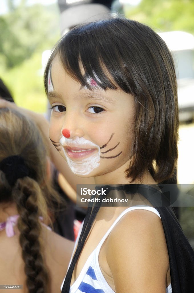 Chica con pintura de la cara - Foto de stock de Niñez libre de derechos