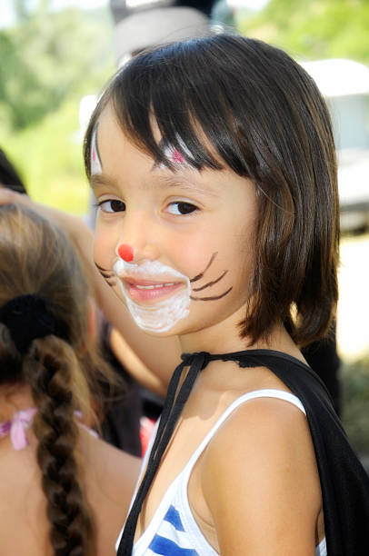 malowane dziewczyna twarz - child face paint summer camp offspring zdjęcia i obrazy z banku zdjęć