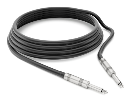 Guitar cable with jacks isolated on white.
