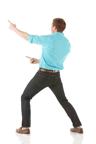 istock Rear view of man pointing with fingers 172445796