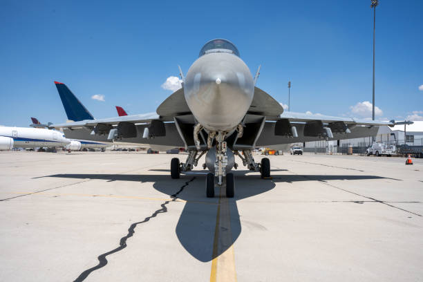 istock F-18 Hornet fighter jet parked at an airfield. 1724461111