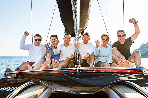 istock Happy sailing crew on sailboat 172446206