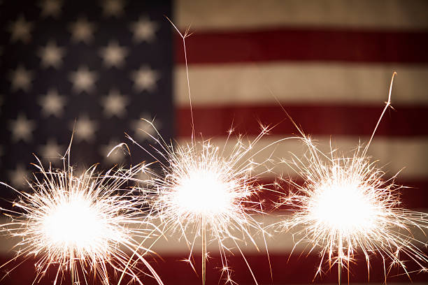 istock Three Sparklers with American Flag 172446299