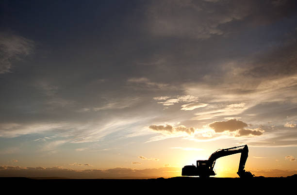 Silhouette of Bulldozer at a Construction Site