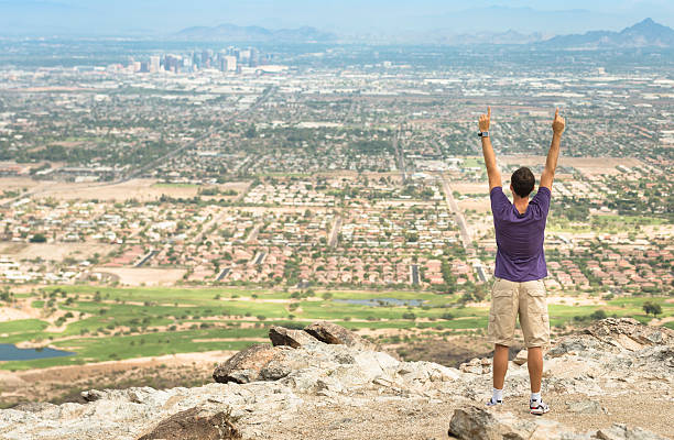 istock Arm raised against the Phoenix city skyline panorama 172446593
