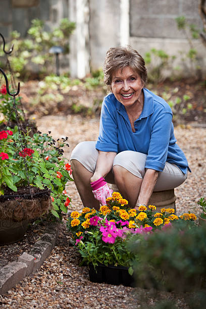 Elderly woman gardening