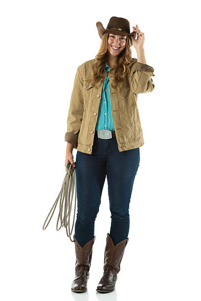 istock Smiling cowgirl standing with a lasso 172447048