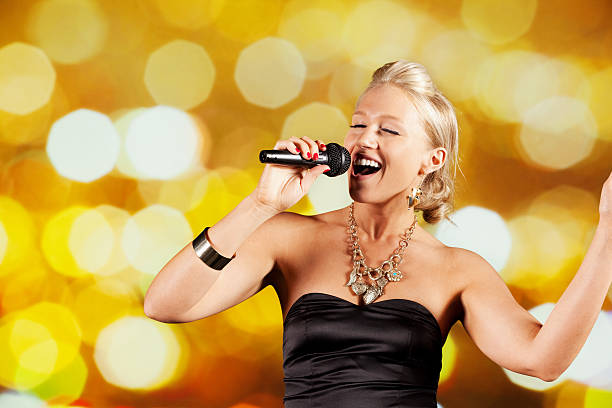istock Attractive female singer 172447102