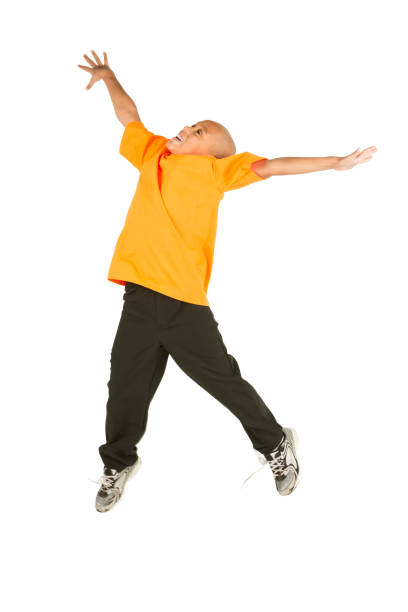istock Happy african american boy jumping on white 172447106