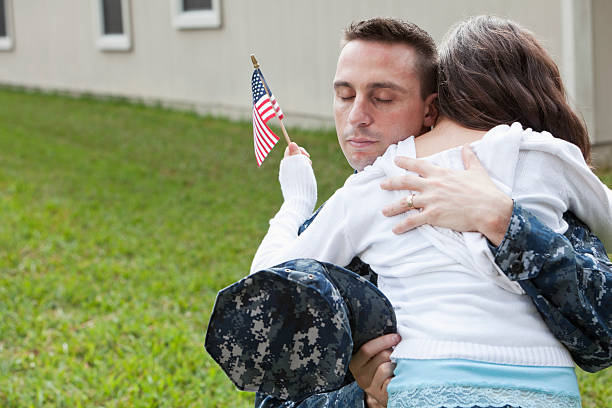 istock Military father hugging daughter 172447299