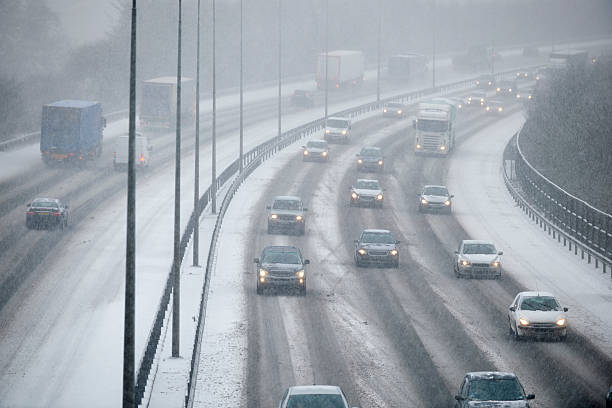 istock Traffic On Motorway During Snowstorm 172447465