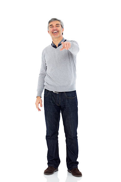 istock Happy mature guy pointing at you over white 172447533