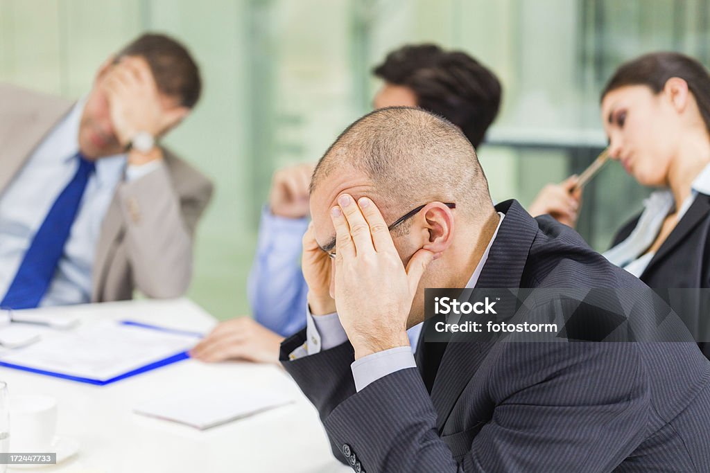 Emotional stress at work Group of business people under stress at the office, having problems at work. 30-39 Years Stock Photo