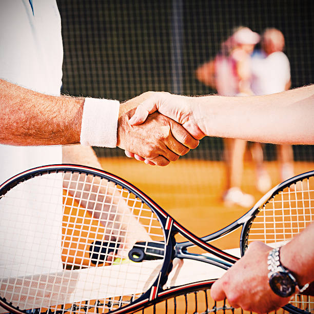 istock Tennis players shaking hands after match 172448114