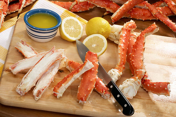 istock Alaskan king crab on preparation board with knife and lemon 172448201