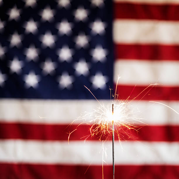 istock Lit Sparkler and America Flag Square 172448317