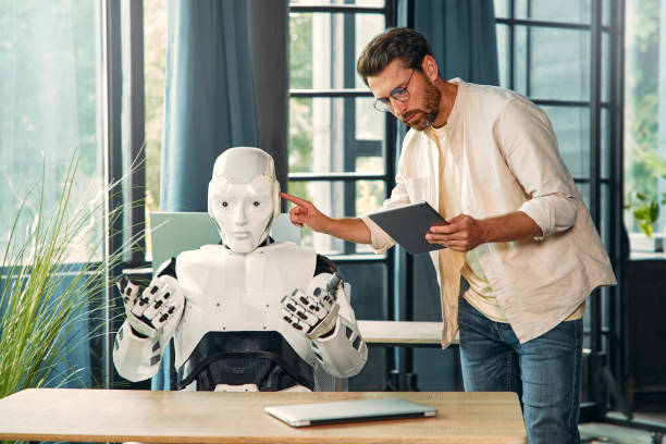 istock Robot and man at home 1724483703