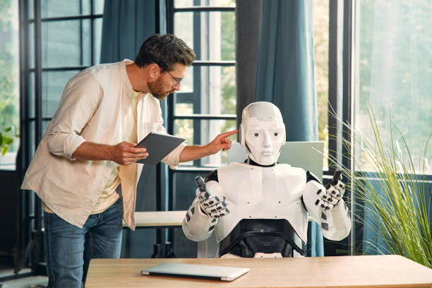istock Robot and man at home 1724483706