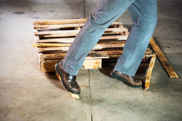 istock Person tripping over a warehouse hazard 172448468