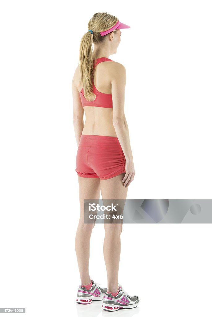Вид сзади женщины, которые позируют спортсмен - Стоковые фото 20-29 лет роялти-фри
