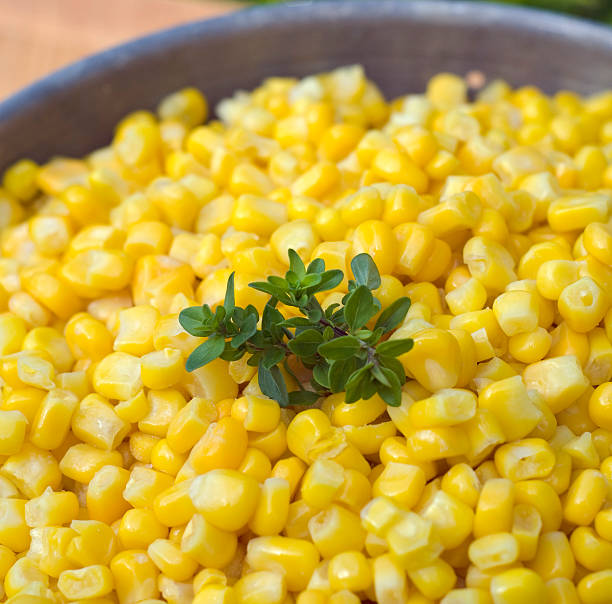 istock Corn Bowl, Sweetcorn Vegetable in Colander & Fresh Thyme Background 172449172