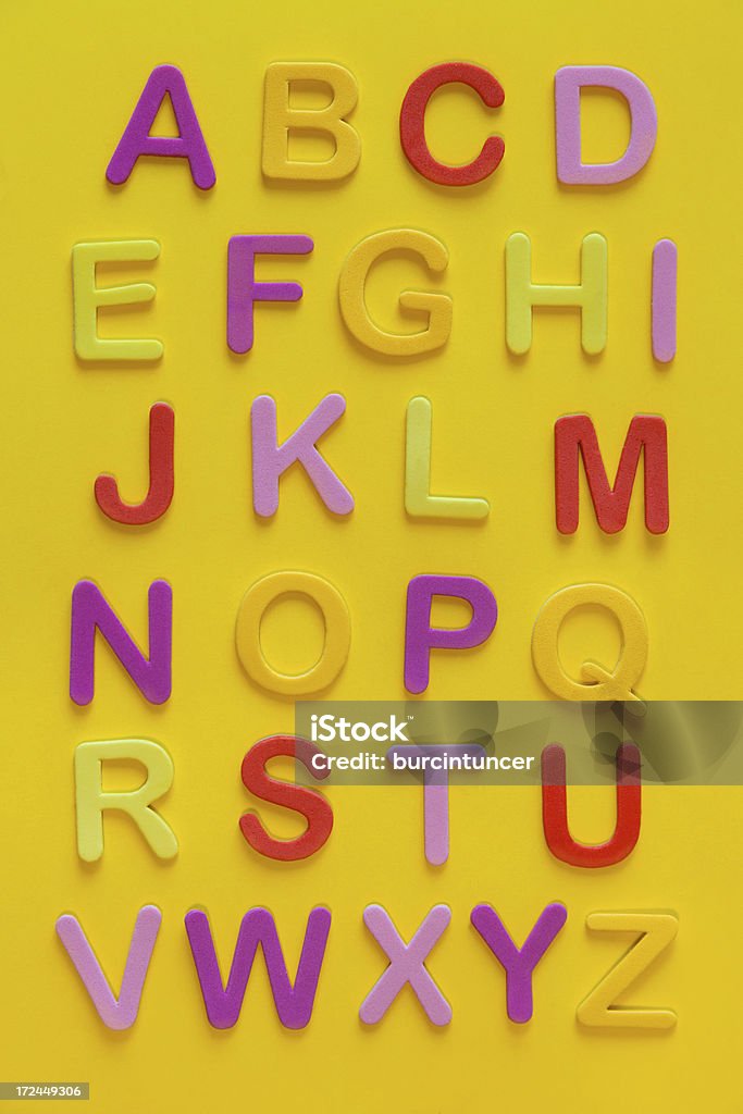 English alphabet with colorful letters English alphabet with colorful letters on yellow background Alphabet Stock Photo