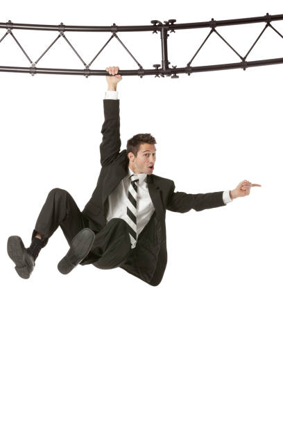 istock Businessman hanging with a metal structure 172449631