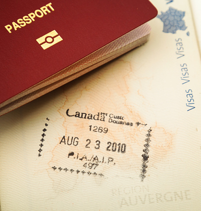 A passport stamp from Canada on French Passport. 