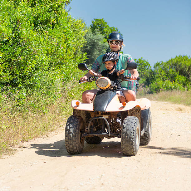 istock Woman and child on ATV 172450052