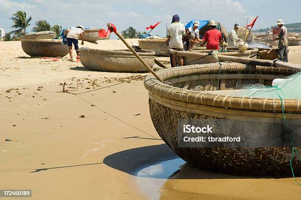 Fishermen On The Beach In Mui Ne Vietnam Stock Photo - Download Image Now - Vietnam, Fishing, Commercial Fishing Net