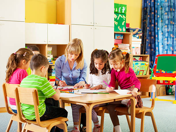 istock Teacher drawing with children. 172450725