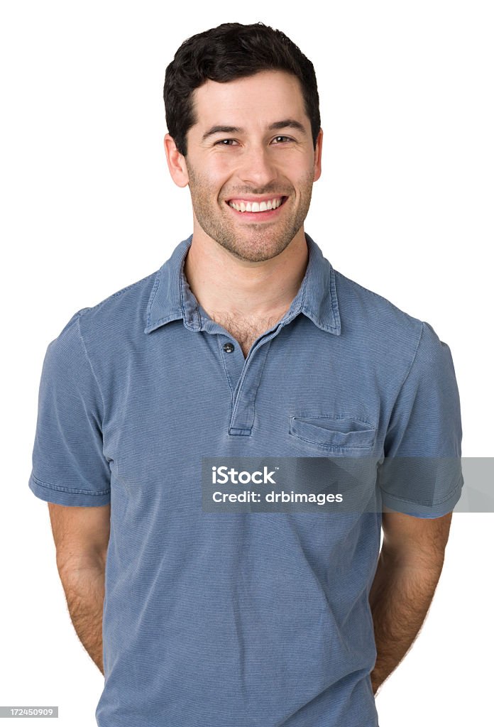 Ritratto di un sorridente giovane uomo guarda alla macchina fotografica - Foto stock royalty-free di Uomini