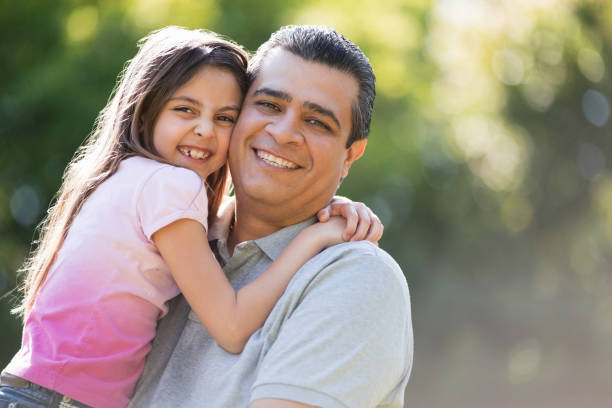 istock Father Carrying Daughter At Park 172452768