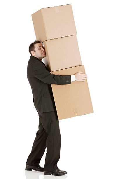 istock Businessman carrying cardboard boxes 172452895