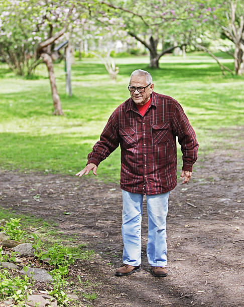 istock Senior Man Gesturing at Nature Park 172452910