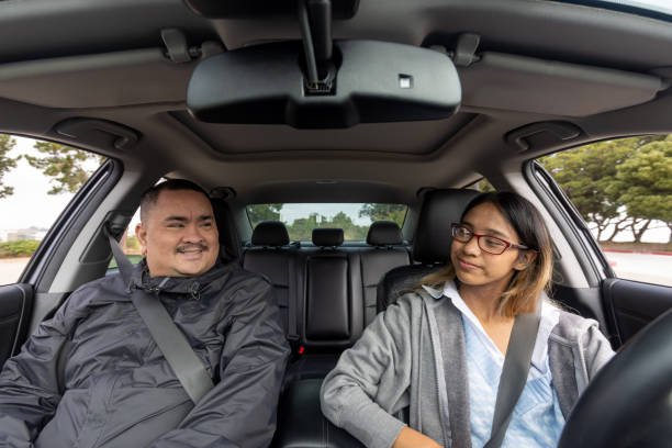 istock Father Teaching Daughter to Drive 1724533461