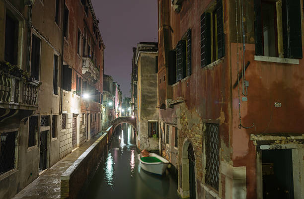 istock Venice quiet canals stucco villas illuminated at night 172453350