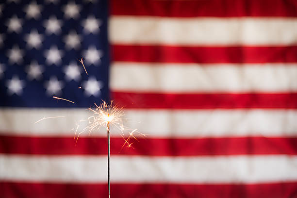 istock Sparkler and  America Flag Horizontal 172453471