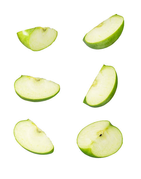 Six sliced pieces of green apple Apple Slices green apple slice stock pictures, royalty-free photos & images