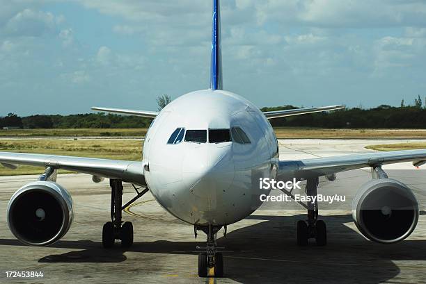 Front View Of A Small Parked Airplane With Two Engines Stock Photo - Download Image Now