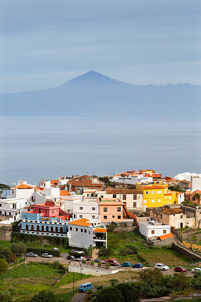 Agulo town and vulcano Teide, Canary Islands "Agulo town on La Gomera with volcano Teide on a horizon, Canary Islands" agulo stock pictures, royalty-free photos & images