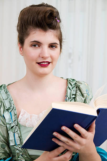istock Young girl with a book 172454024