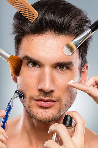 istock Man applying various beauty products 172454165