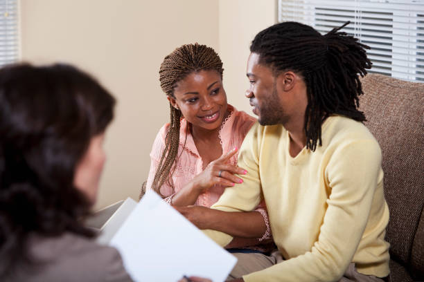 istock Advisor with African American couple 172454311