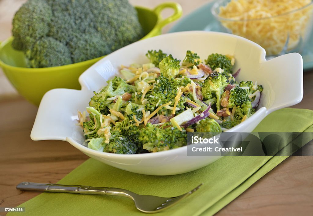 Broccoli Salad "Salad bowl with broccoli salad - ingredients: broccoli, cheddar cheese, red onion, bacon with mayonnaise, sugar and vinegar dressing" Broccoli Stock Photo