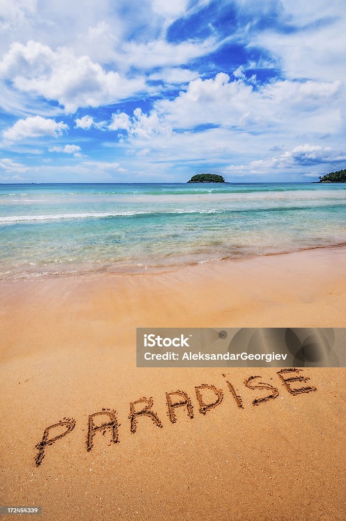 Paradise escrito en la arena - Foto de stock de Agua libre de derechos