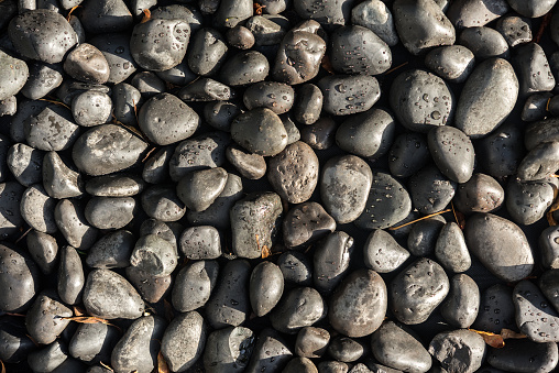 Black pebble stone background for your presentations.