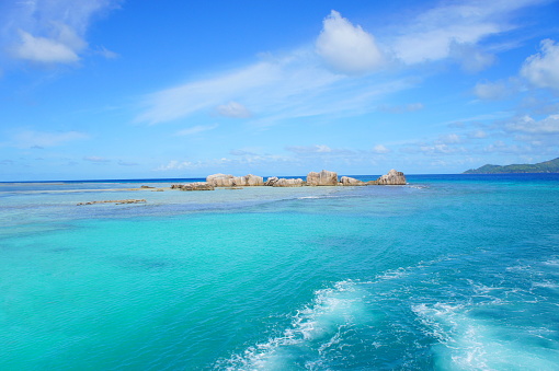 Seychelles blue ocean La Dig tropical island.