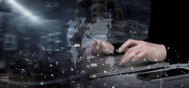 istock Businessman working on a laptop with currency transactions. 1724546890